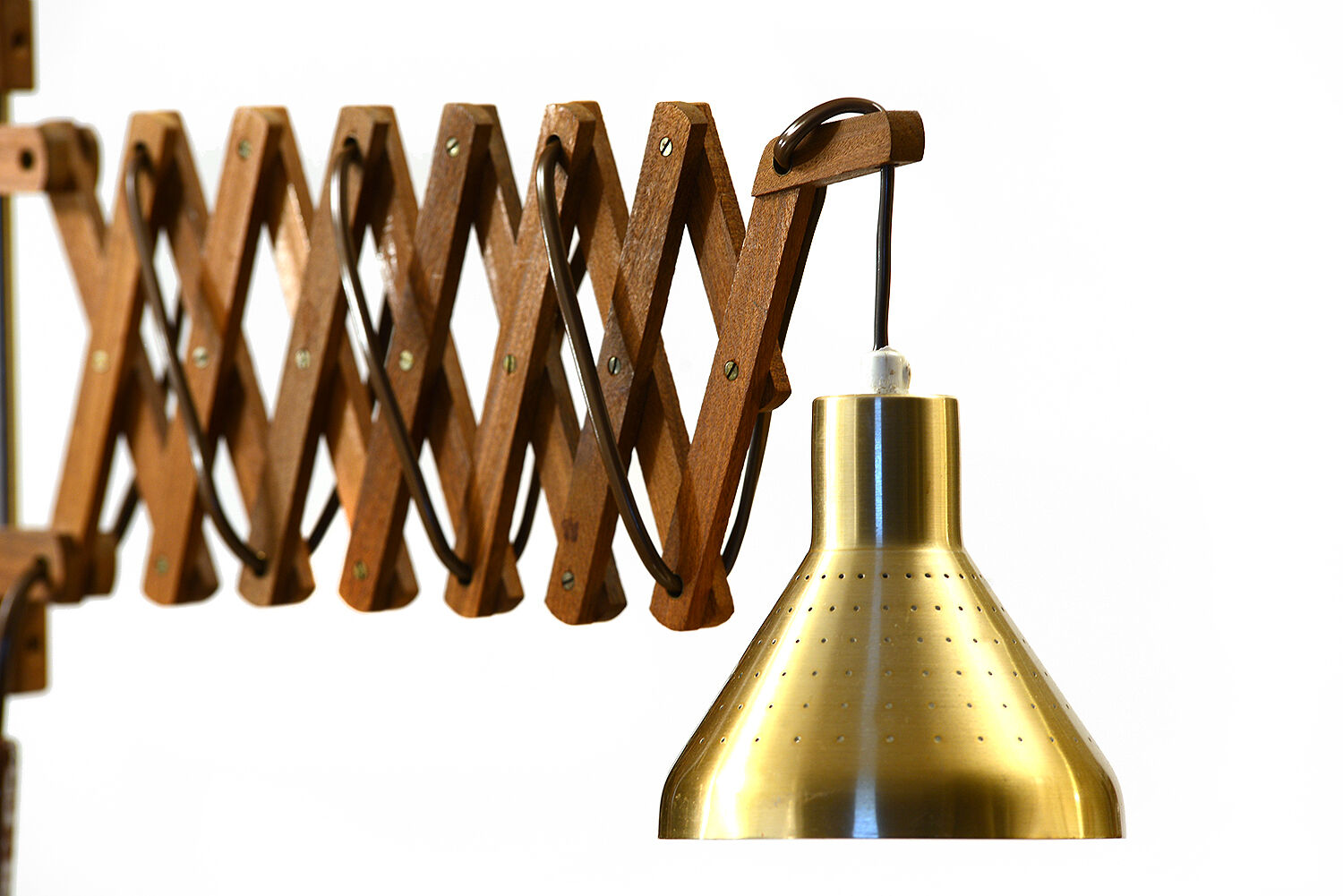 Solid teak wall lamp/Scissor lamp with brass coloured aluminium shade.