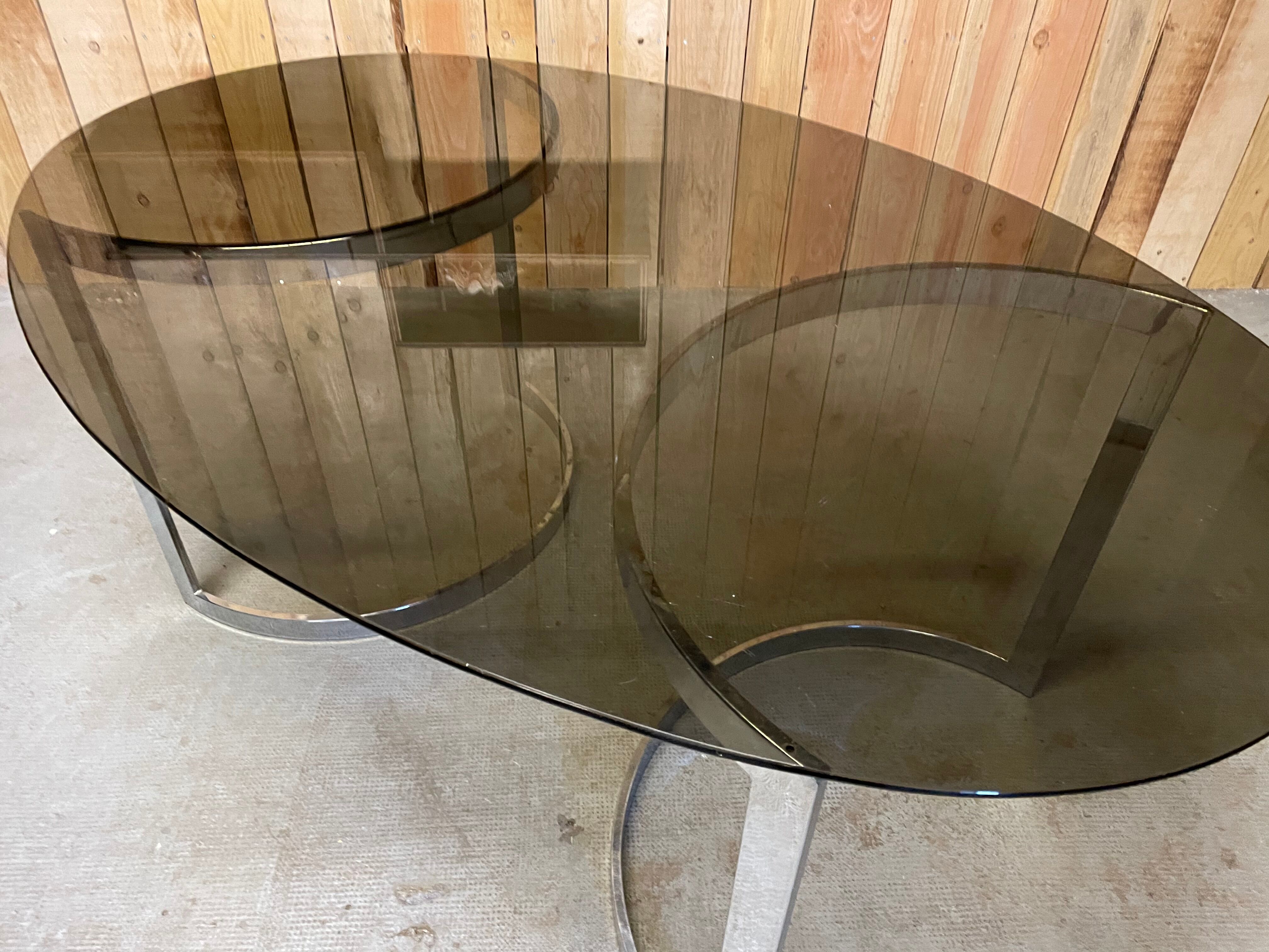 Glass oval dining table by Milo Baughman