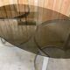 Glass oval dining table by Milo Baughman