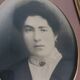 Old photo portrait framed in wood and stucco