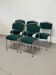 Set of 5 green padded vintage stackable chairs.