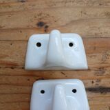Set of two porcelain tea towel holders