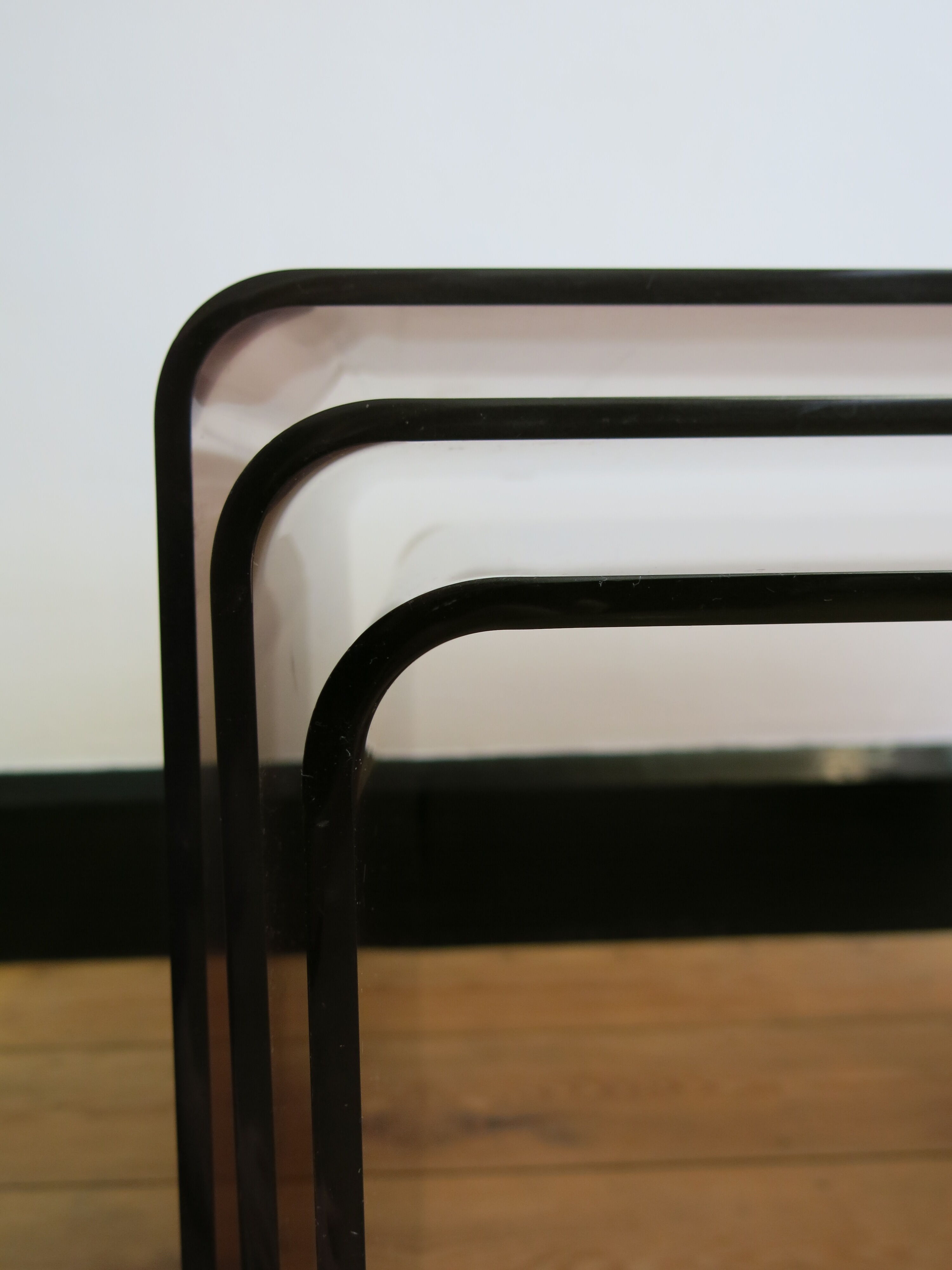 Trio of plexi nesting tables signed Michel Dumas