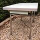 Formica table set with extensions + 4 Plastilux chairs