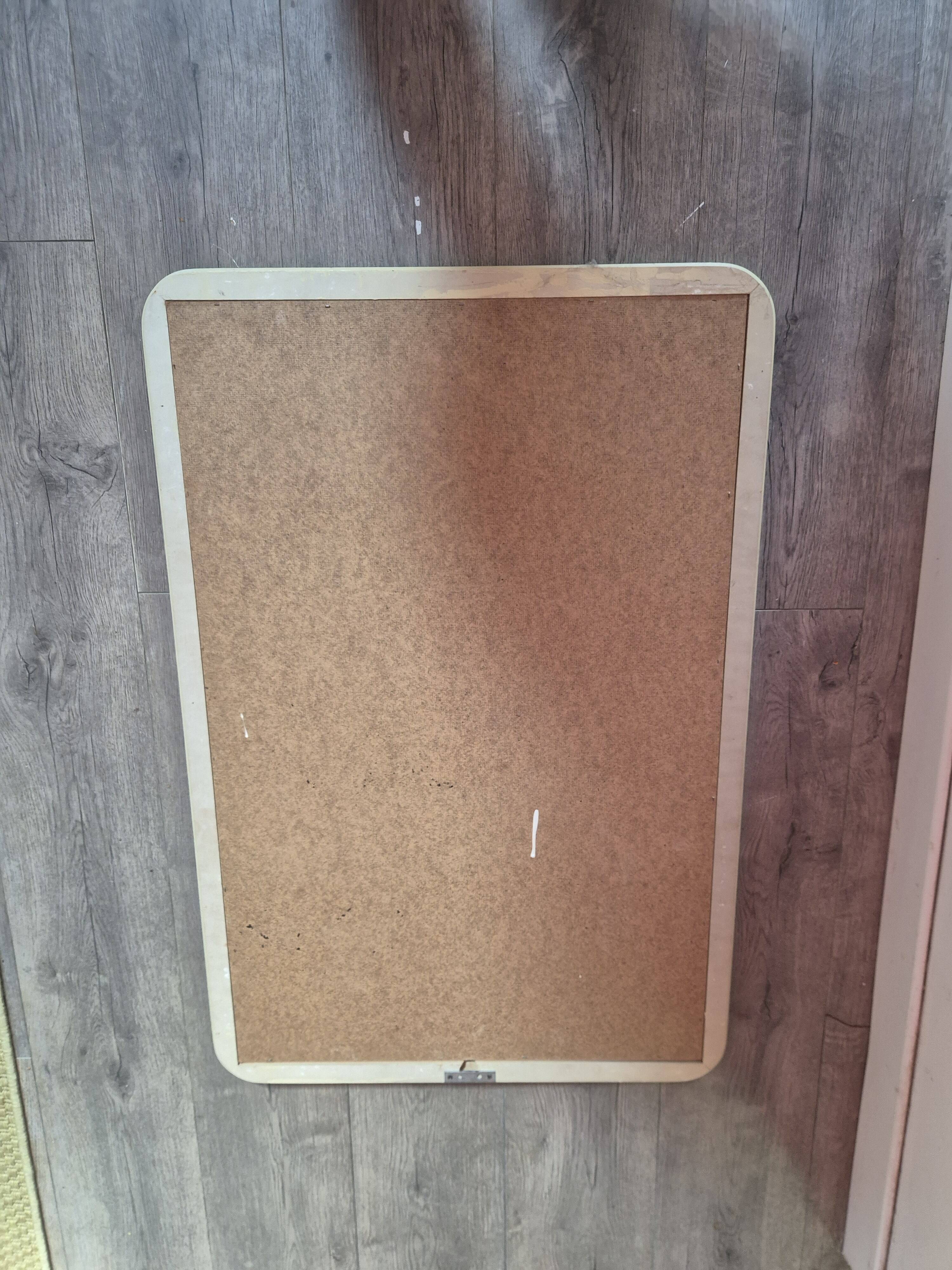 vintage mirror from the 70s with a large beige border, 90 by 60 cm
