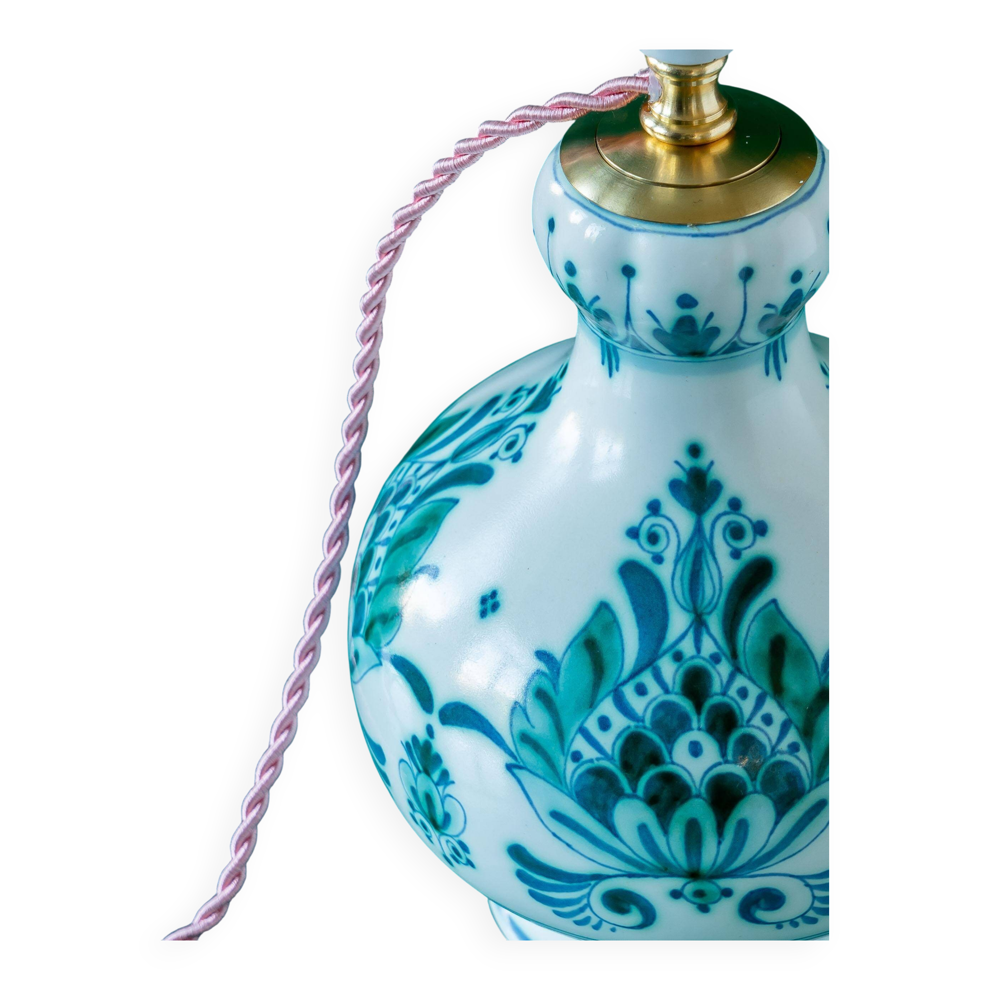 Royal Delft blue-green ceramic table lamp with pink jacquard peacock shade.