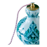 Royal Delft blue-green ceramic table lamp with pink jacquard peacock shade.