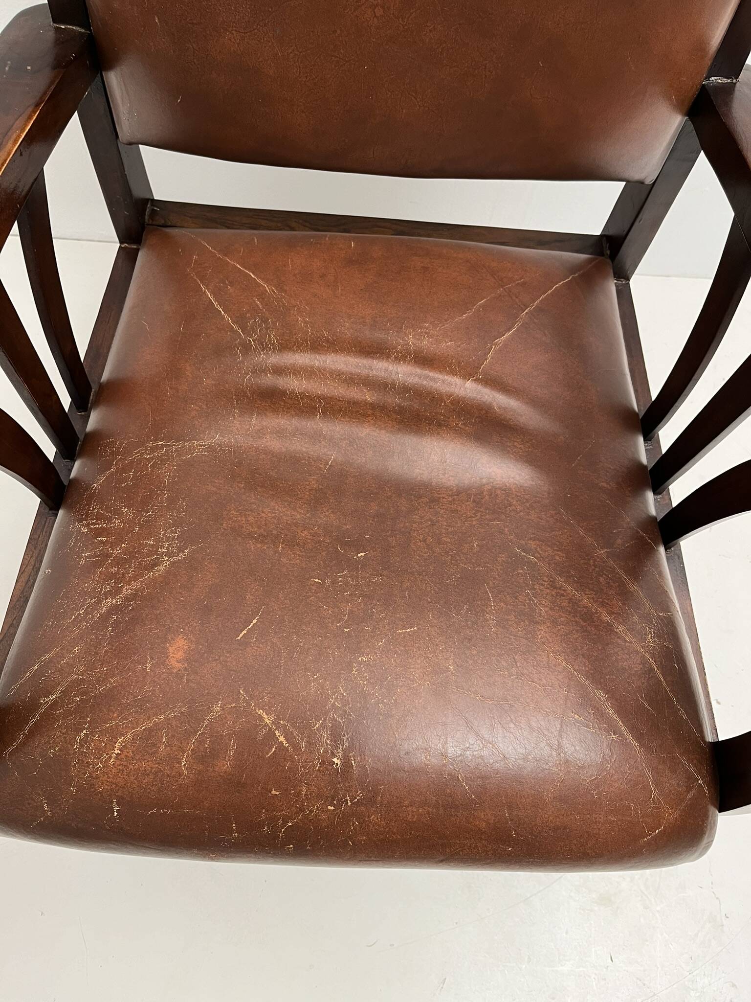 Colonial armchair in teak and leather