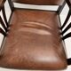 Colonial armchair in teak and leather