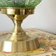 Art Deco green moulded glass globe table lamp with a brass base.