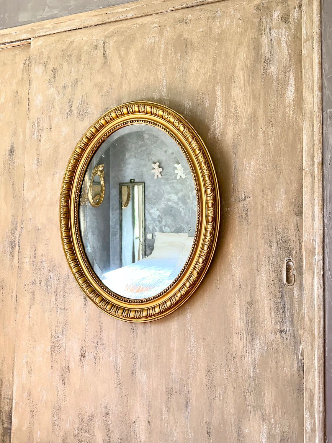 Old oval mirror late nineteenth