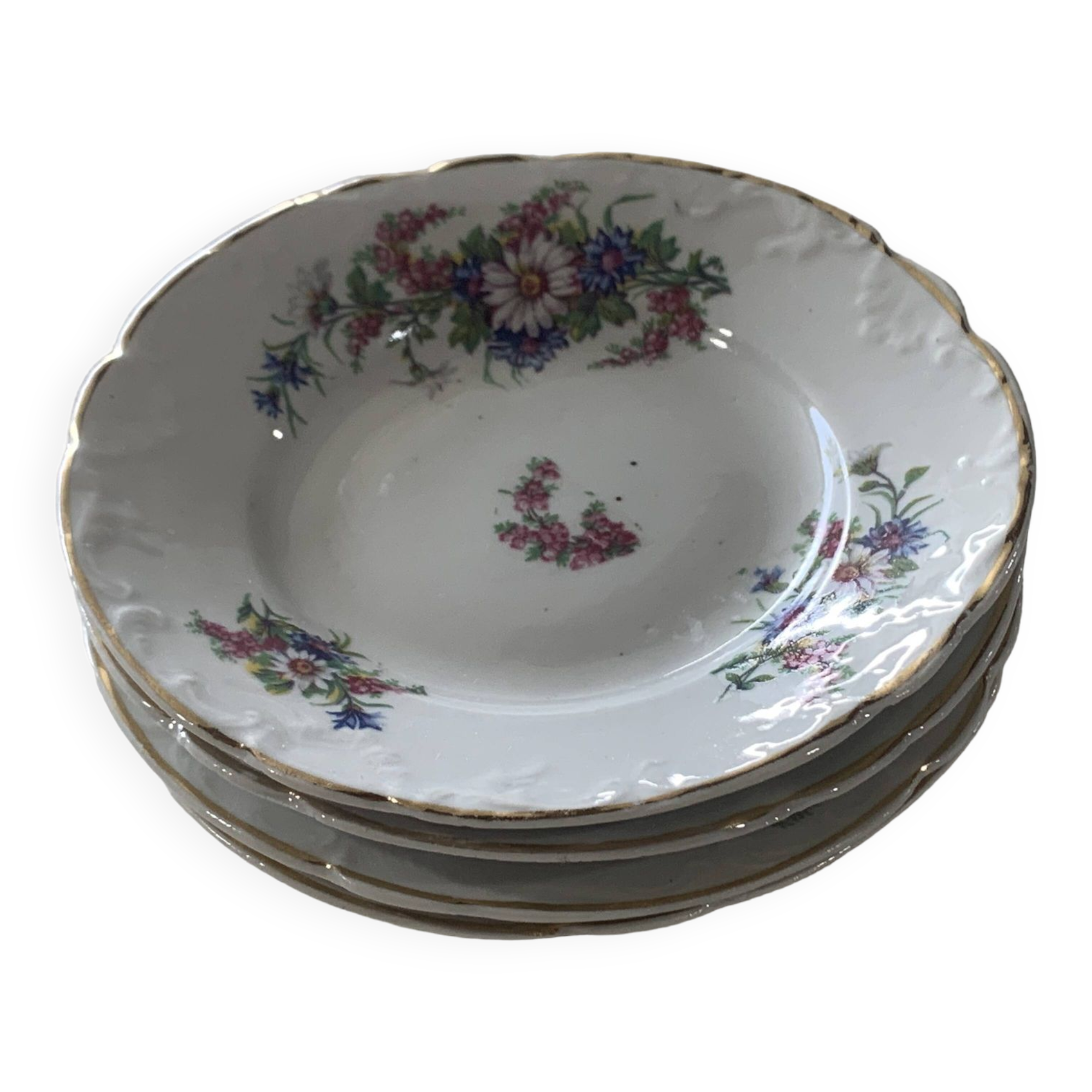 4 vintage porcelain saucers