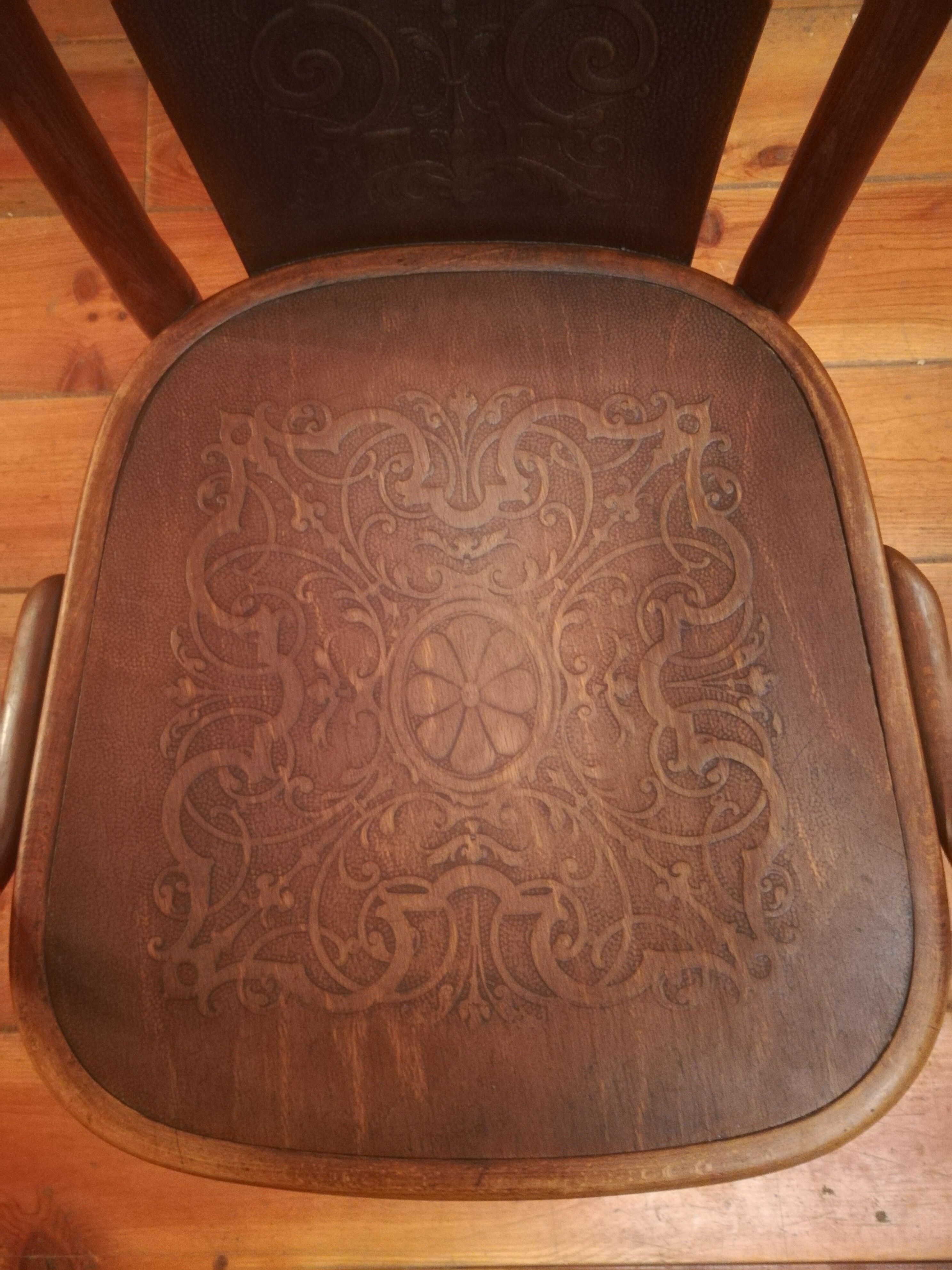 Thonet armchair in curved wood and stylized patterns