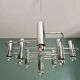 Large geometric chandelier in chrome metal, design by G. Sciolari, 1970.