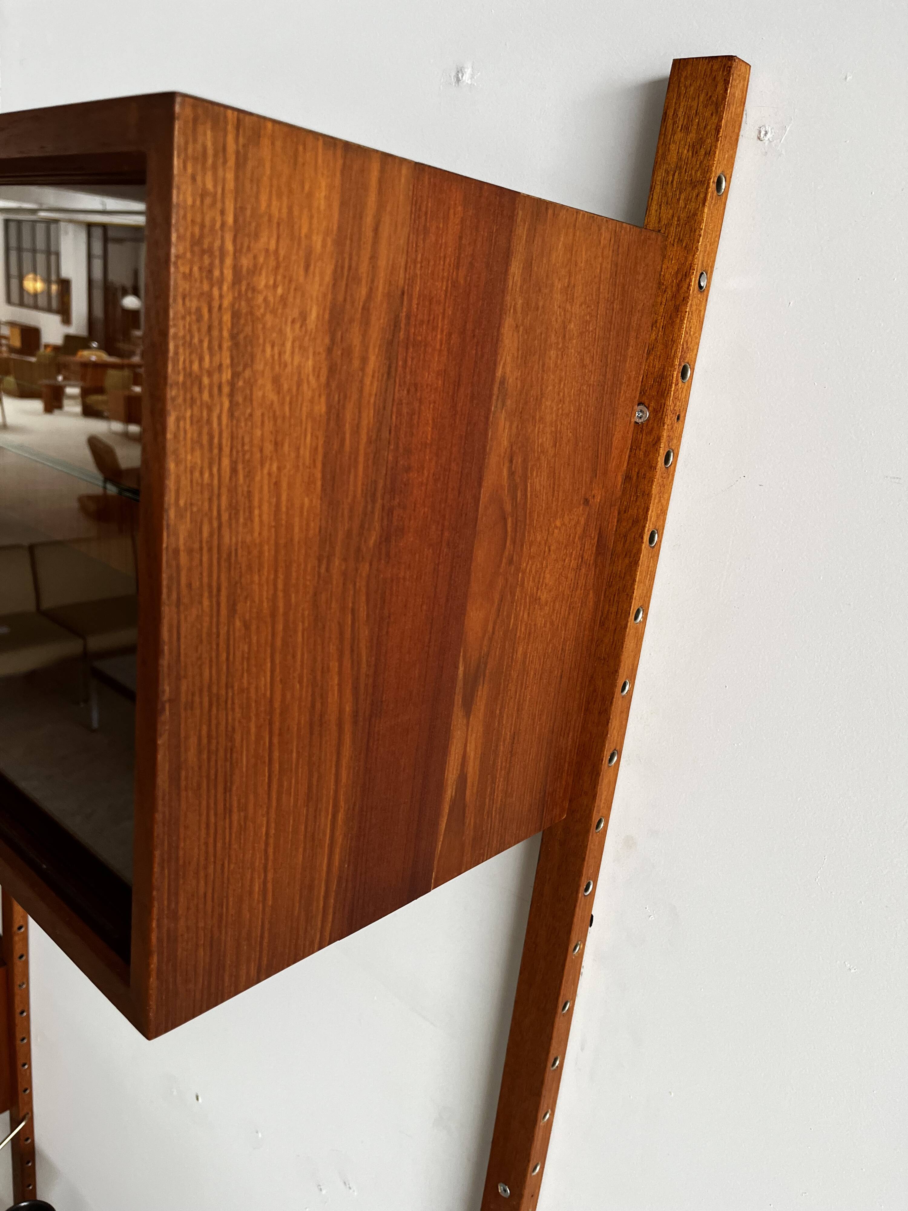 A wall unit with 4 compartments by Poul Cadovius, Denmark, 1960s.