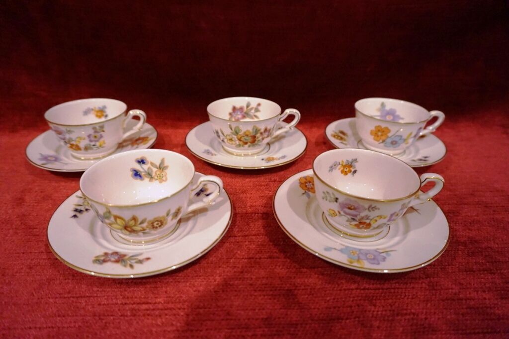 Old saucer cup in pink porcelain of Limoges