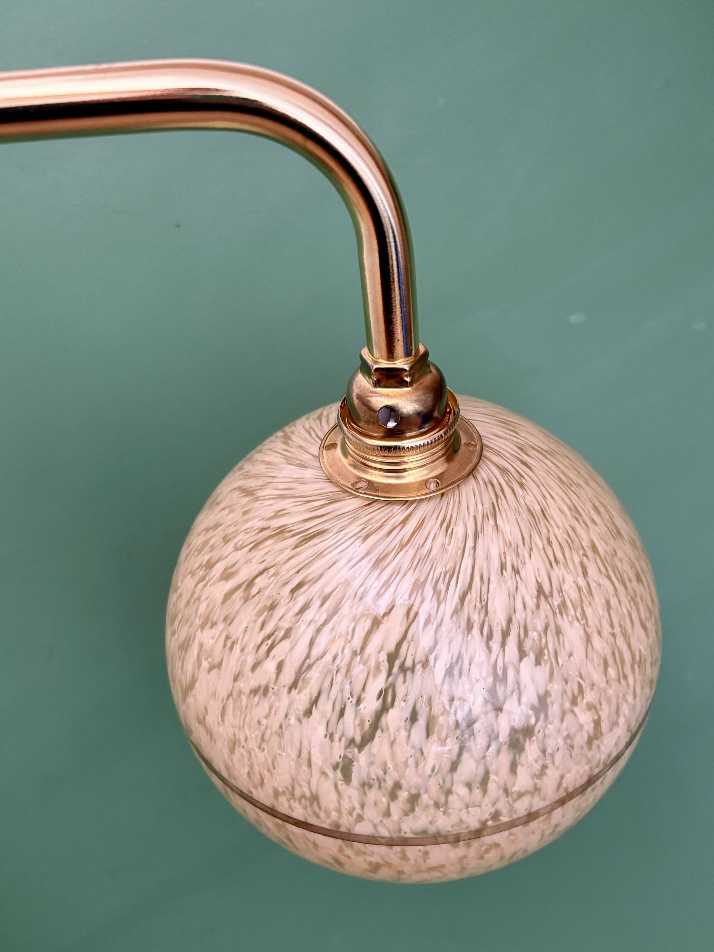 Vintage glass globe wall light in yellow and silver from Clichy.