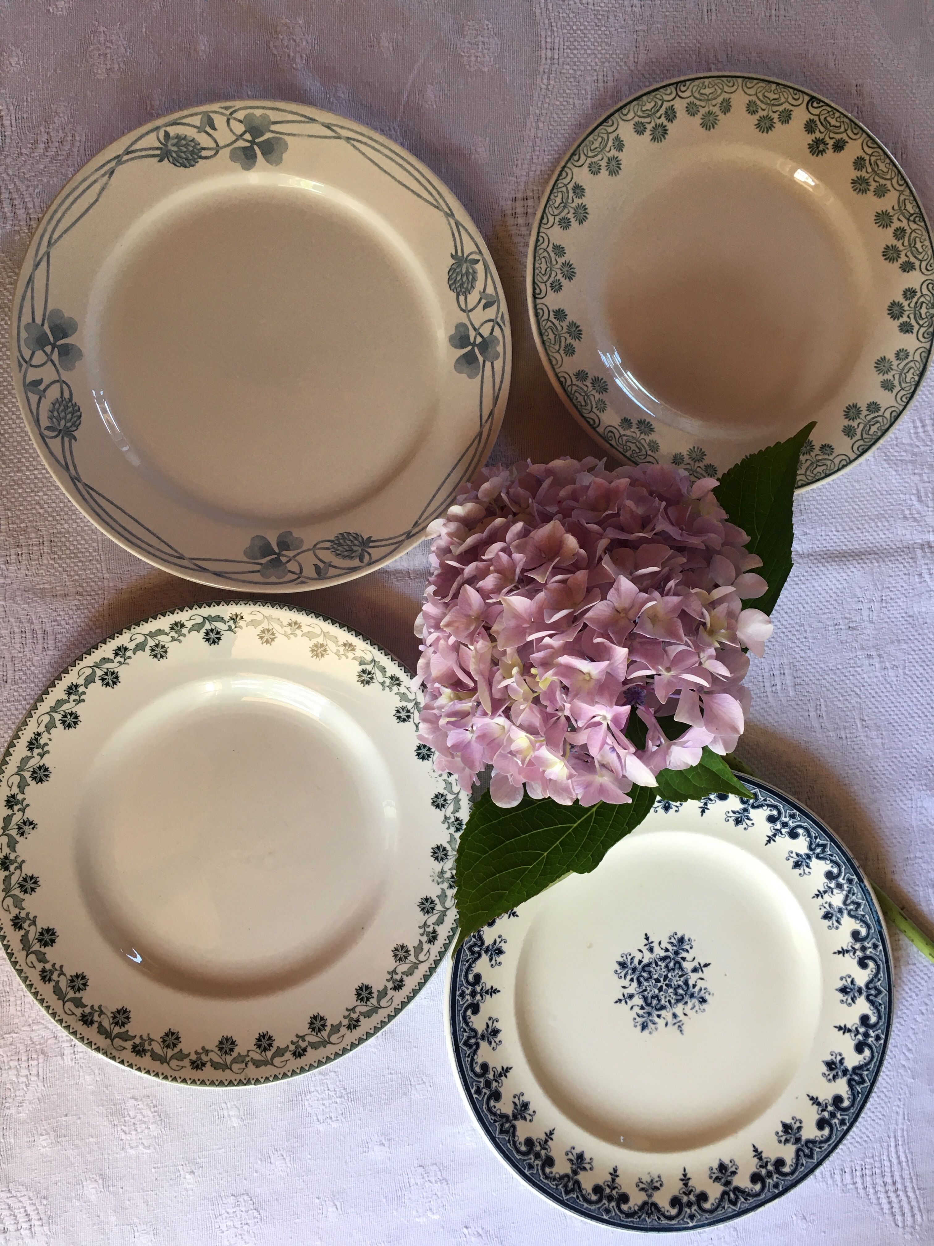 Set of 4 old plates with blue-green décor