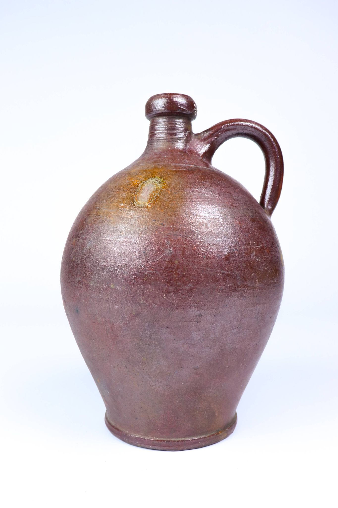 Old enamelled stoneware jug