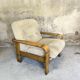 Fauteuil vintage en bois et laine