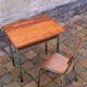 Vintage teak and solid oak schoolwork and its 50 year chair