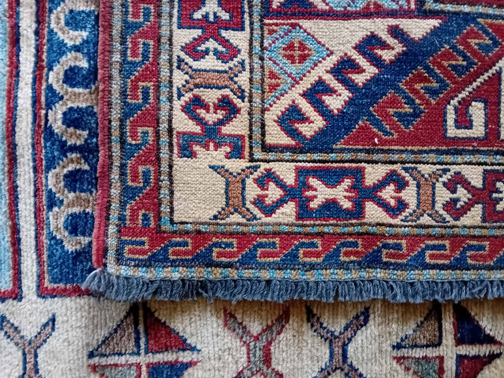 Handmade Pakistani Kazak rug 235x184cm