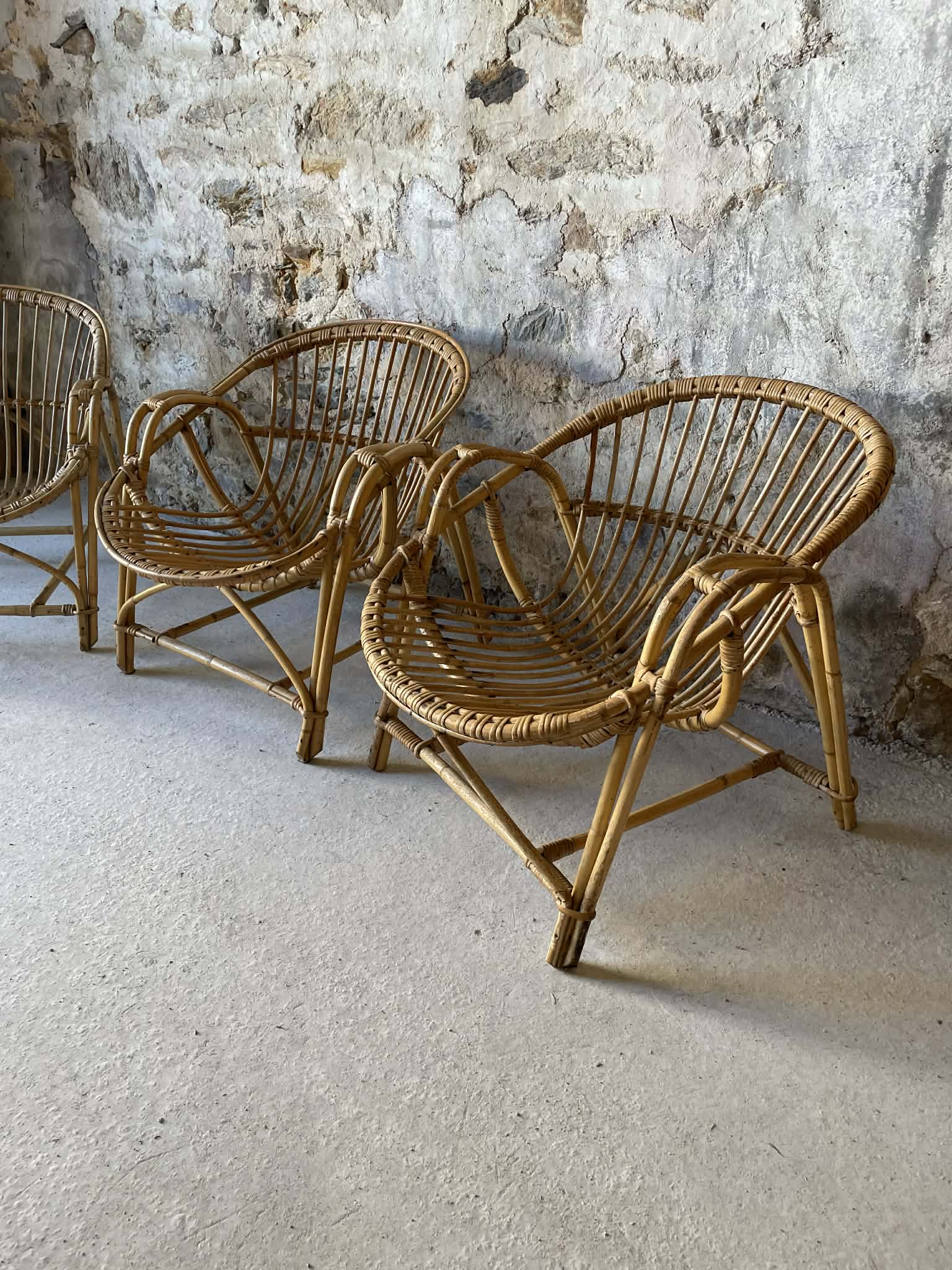 Vintage wicker armchair from the 1970s.