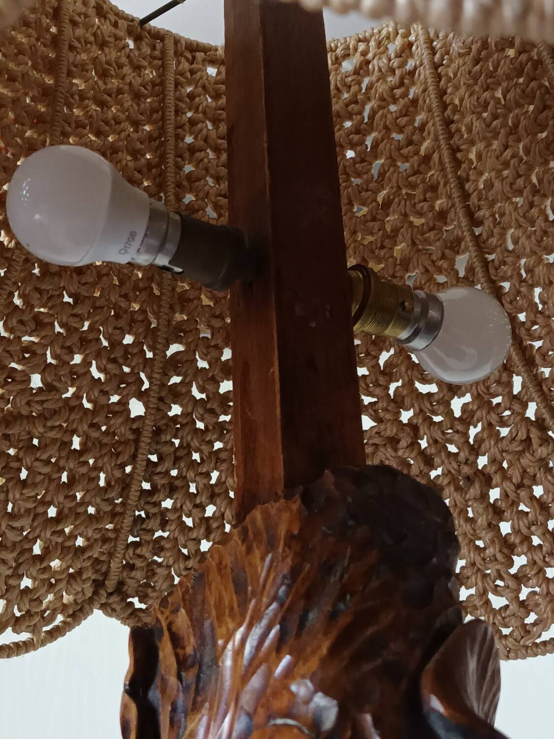 Sculpted wooden table lamp with vintage cord