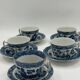 Set of 5 vintage porcelain cups and saucers with Blue Willow pattern.
