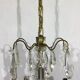 4 light bronze and crystal chandelier