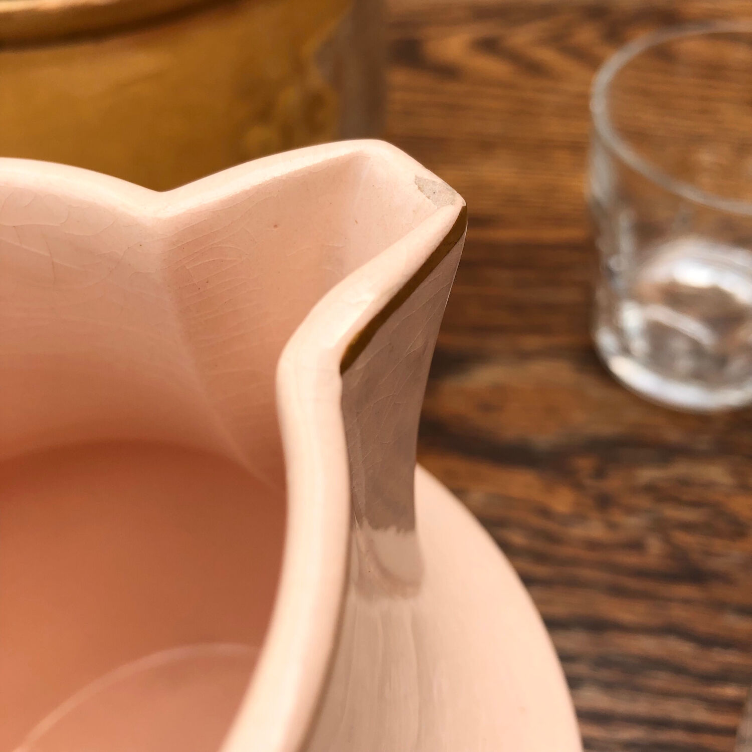 Antique pitcher in pink ceramic