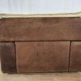 Fauteuil avec pouf en cuir et daim