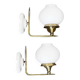Pair of vintage wall sconces in brass with white glass globe shades.