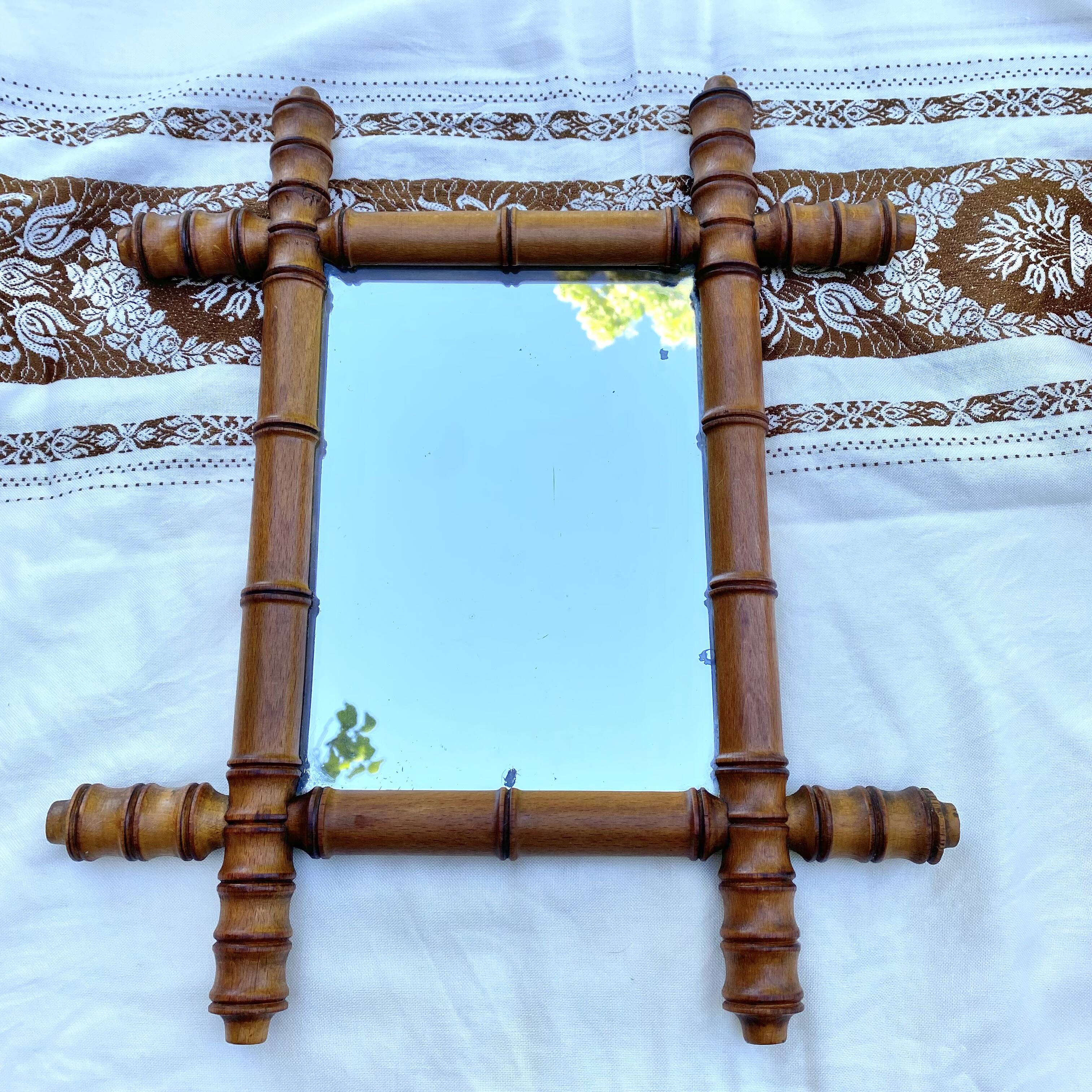 Antique mercury mirror in bamboo-style wood