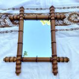 Antique mercury mirror in bamboo-style wood