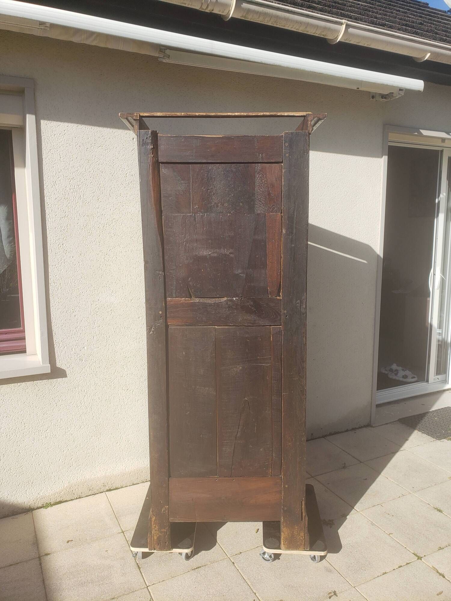 Vintage Louis Philippe style bonnetière wardrobe from the 1800s in cherry wood.