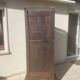 Vintage Louis Philippe style bonnetière wardrobe from the 1800s in cherry wood.