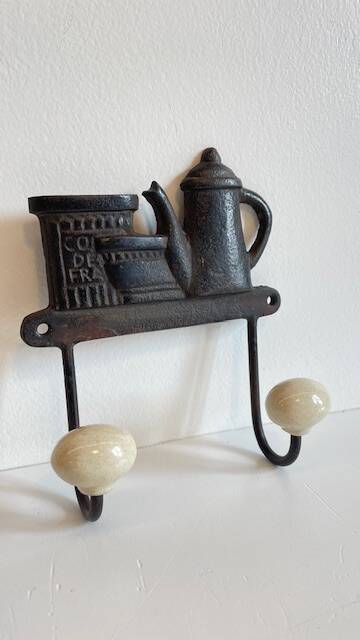 Coat rack made of steel and porcelain