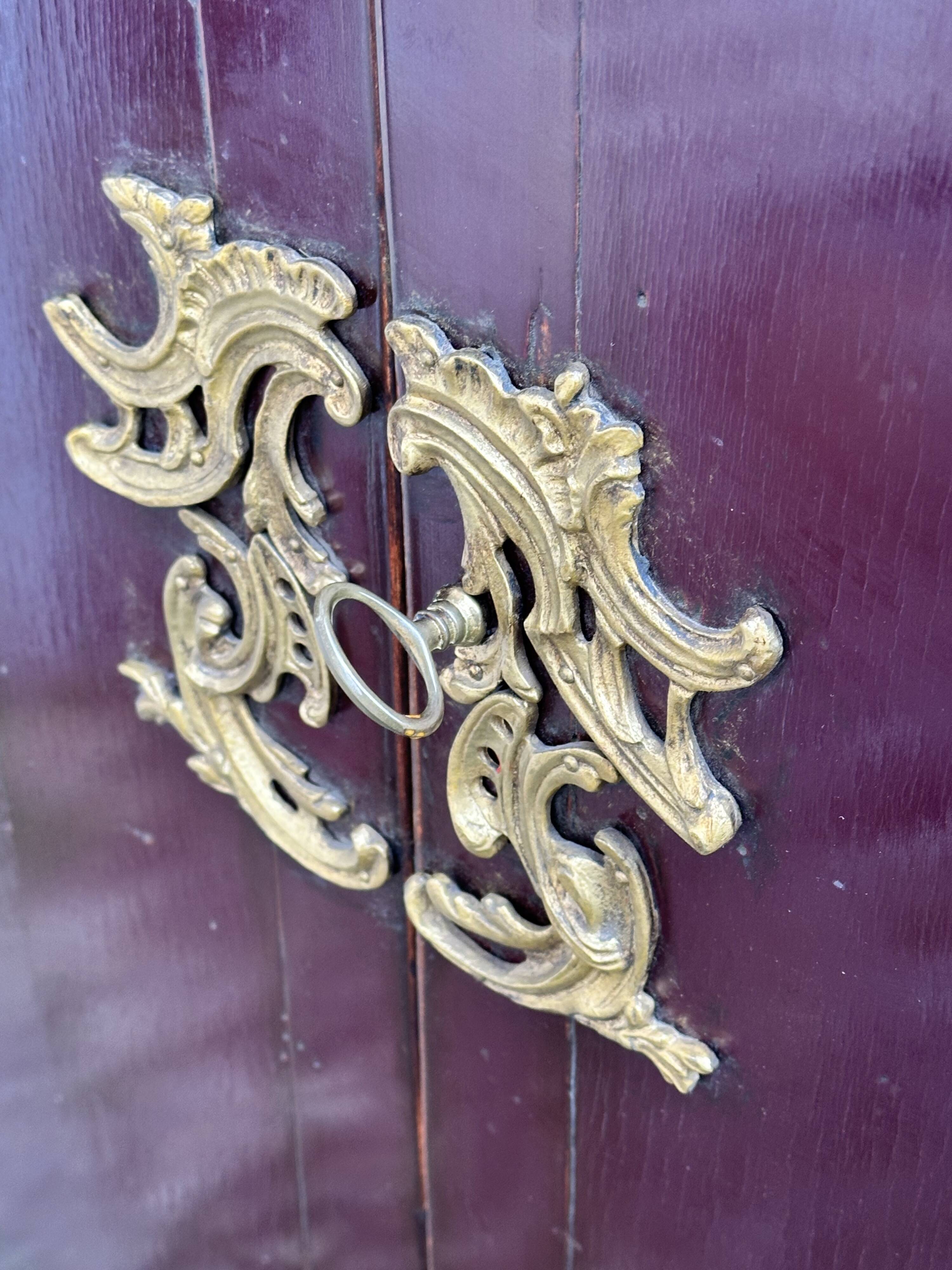 1950's lacquered wood and brass sideboard