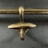 Antique coat rack in gilded metal