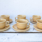 6 coffee cups and 6 sandstone saucers