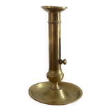 Antique brass push candle holder