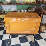 Low storage bar cabinet on casters from the 60s