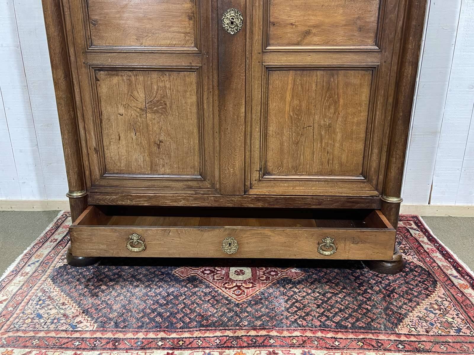 Empire wardrobe from the early 19th century in oak.