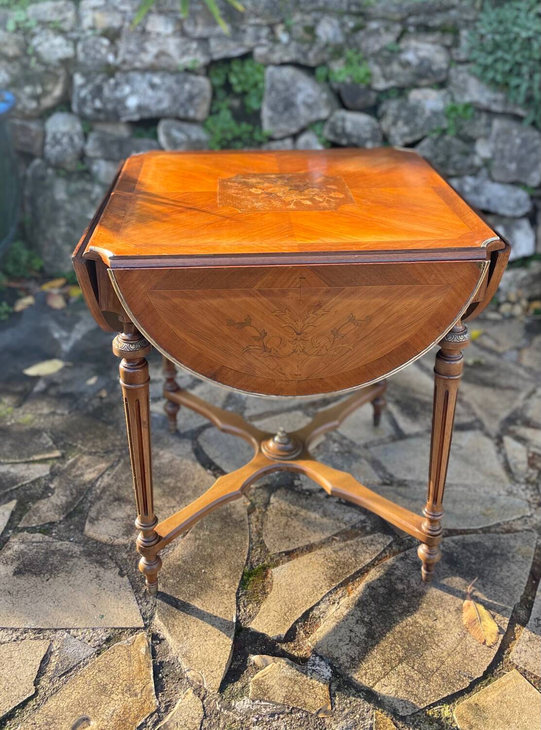 Center table decorated with marquetry of leaves and flowers in Louis XVI style, 19th century period