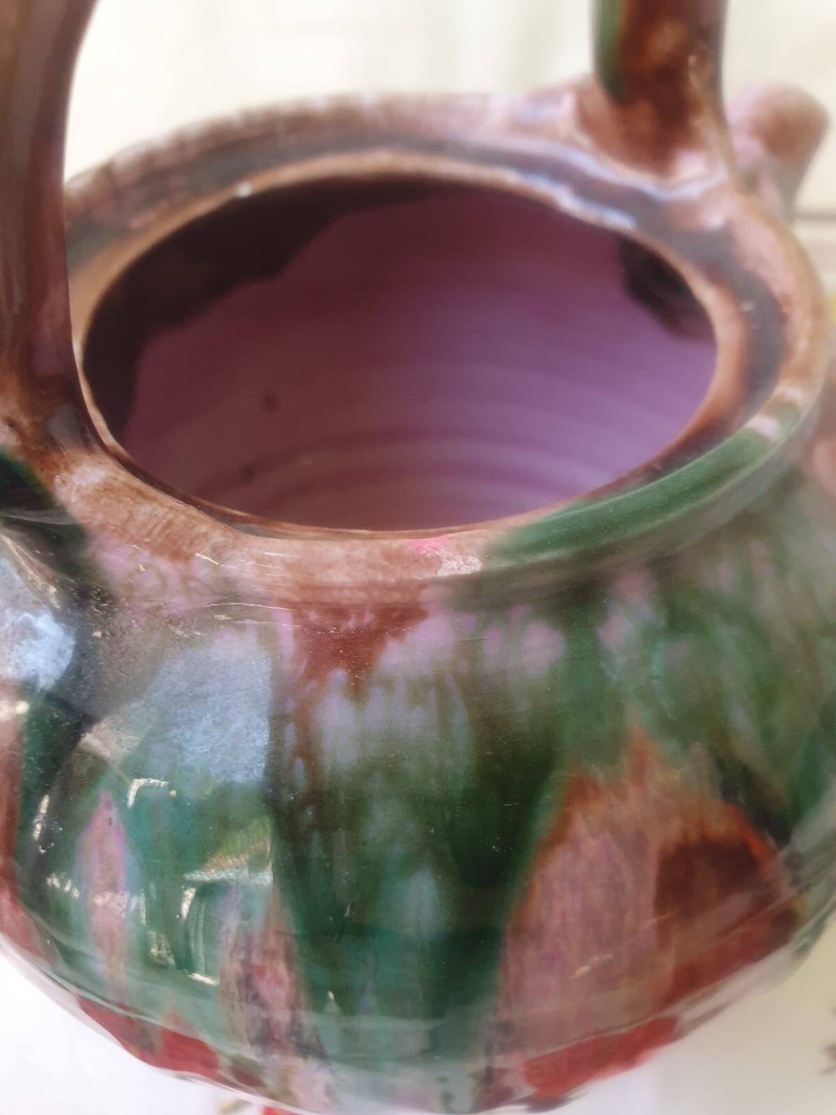 Jug pitcher Provençal earthenware glazed with pink and green glaze.