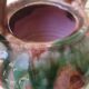 Jug pitcher Provençal earthenware glazed with pink and green glaze.
