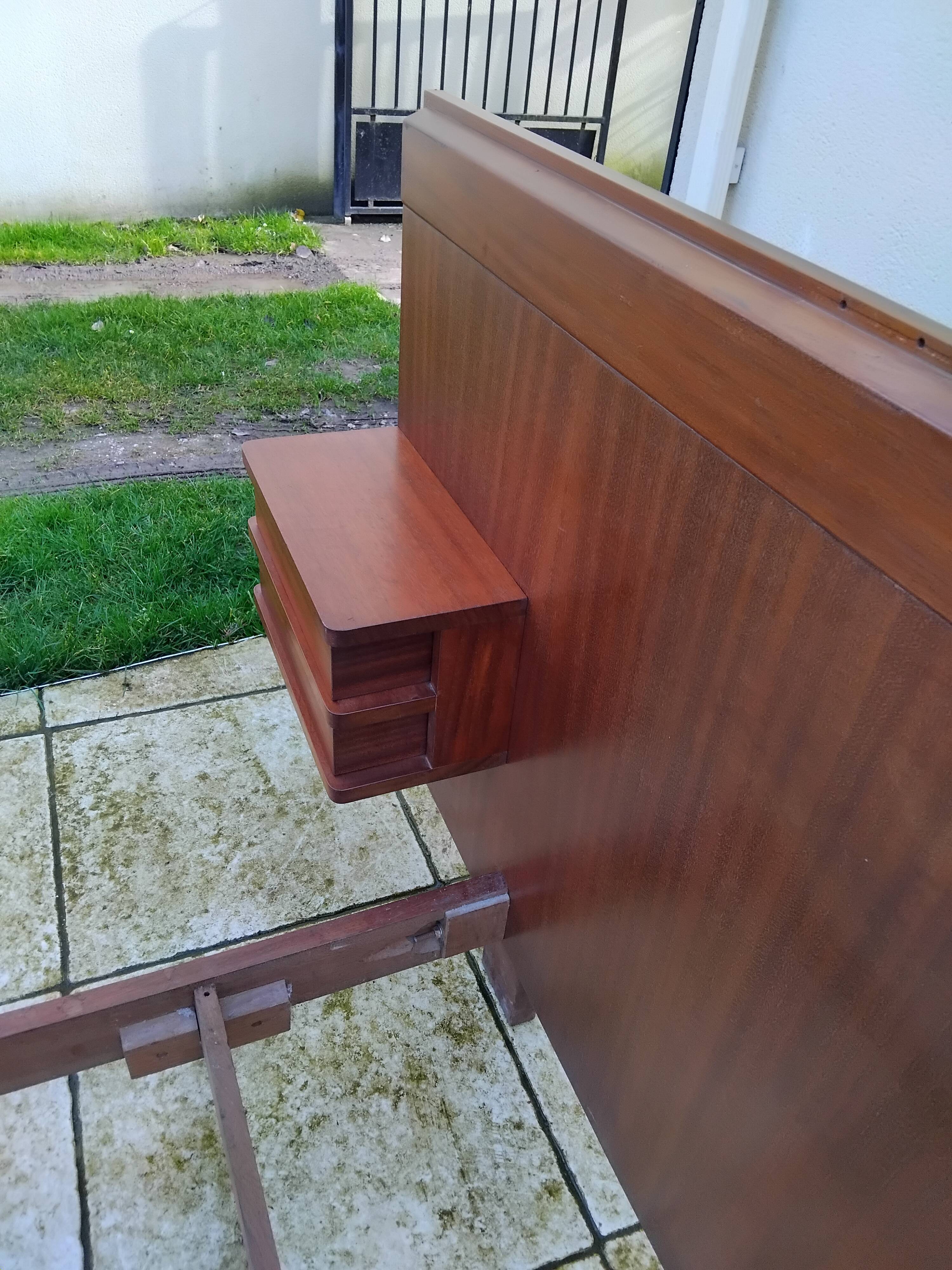 Vintage Scandinavian teak adult bed from the 60s and 70s bedside table.