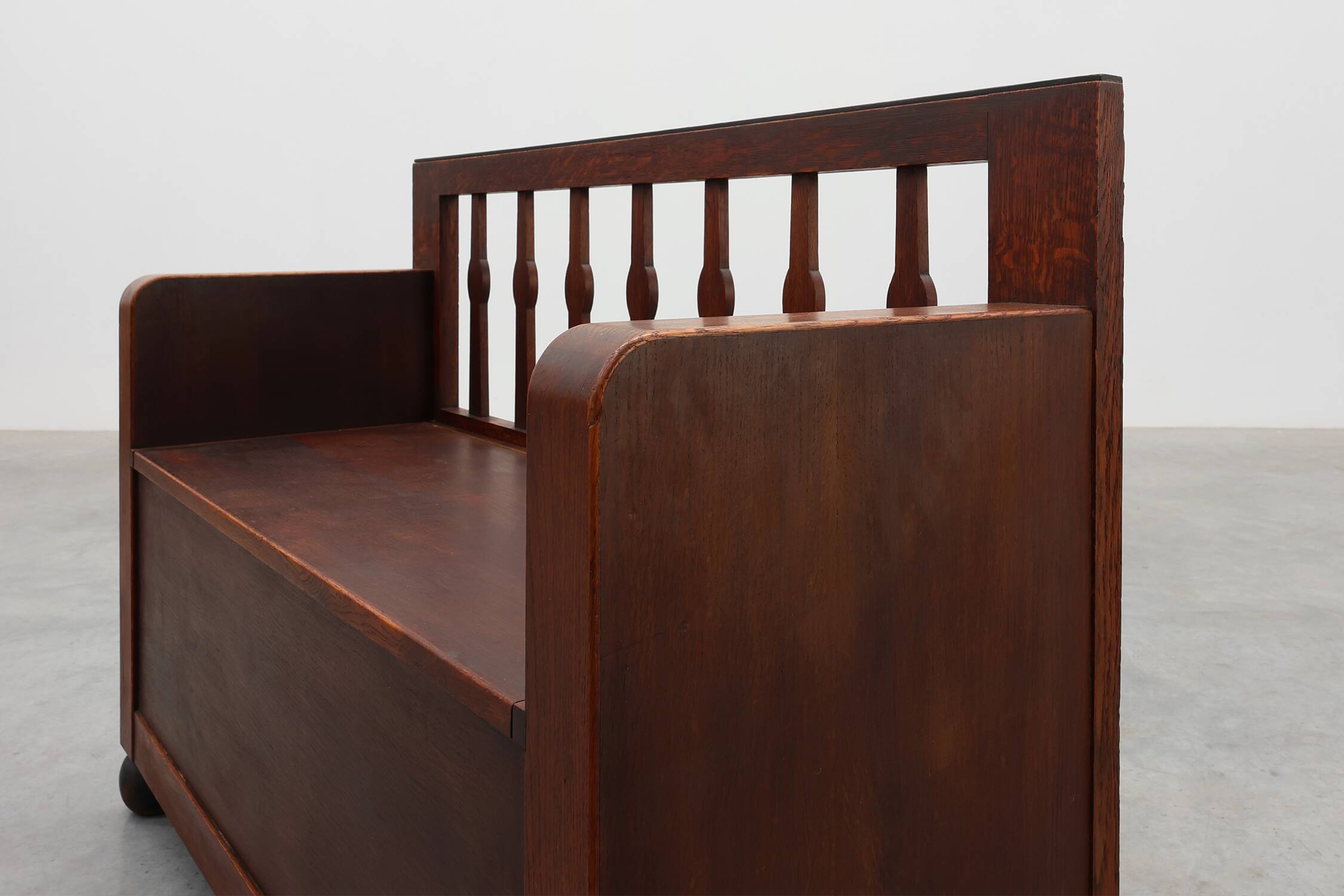 Modernist Art Deco bench with lift-top storage seat in solid oak, Belgium