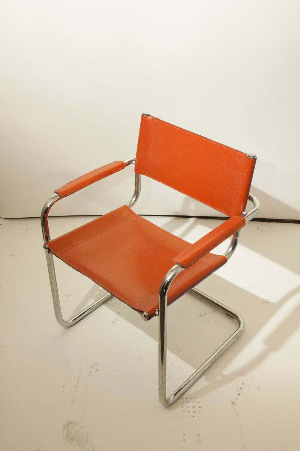 Fauteuil vintage en métal et cuir